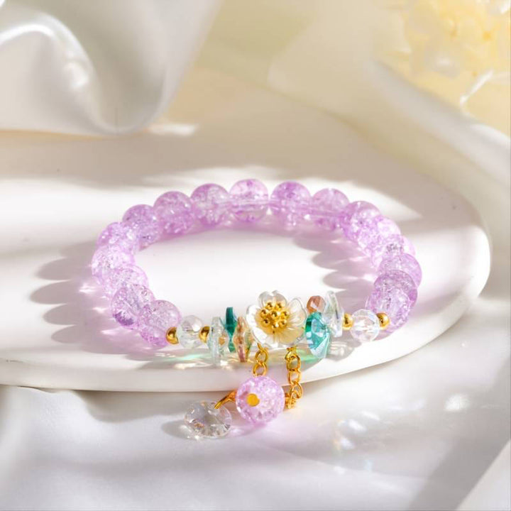 Pulsera de cuentas de cristal con dije de flor de diseño simple con Buddha Stones