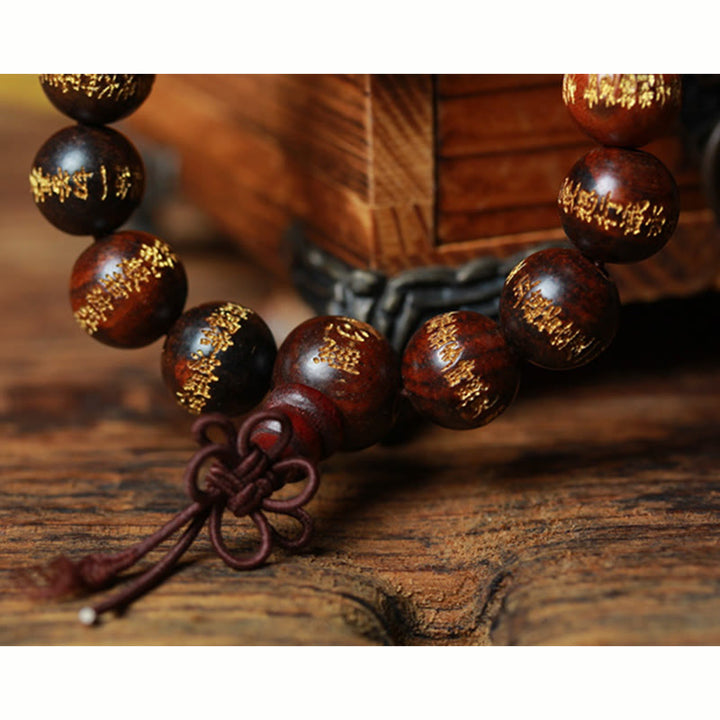 Pulsera de curación grabada con sutra de corazón de palisandro tibetano