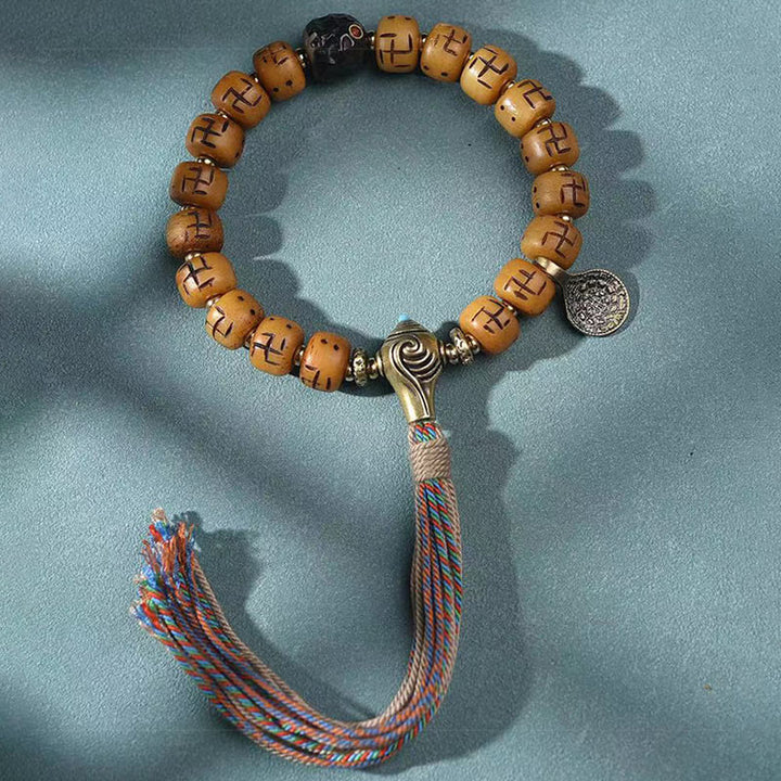 Buddha Stones, hueso de camello tibetano Natural, esvástica, cuentas Dzi, amuleto de Buda Shankha, Kirtimukha, pulsera con borla de protección de la suerte