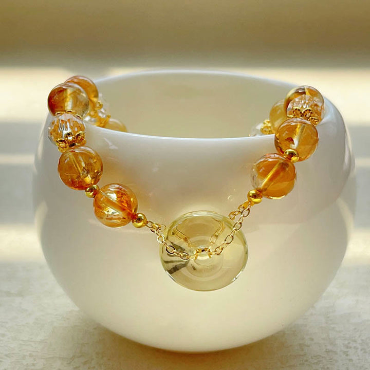 Pulsera de prosperidad de cristal citrino con hebilla de paz y Buddha Stones