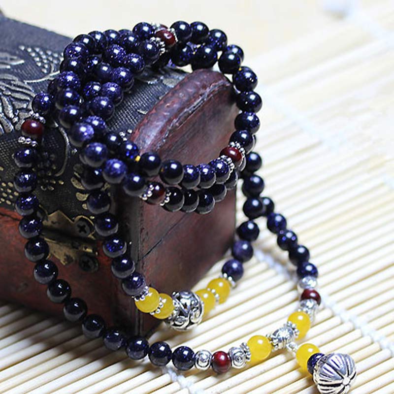 Pulsera con dijes de riqueza de piedra arenisca azul de piedras de Buddha Stones Mala