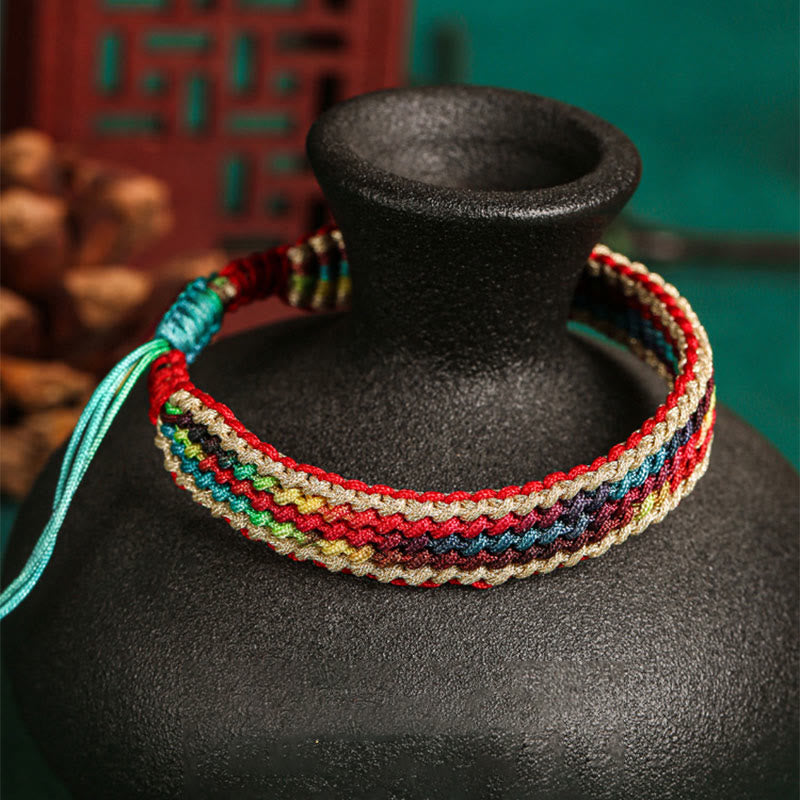 Pulsera de hilo trenzado con protección multicolor de arcoíris hecha a mano con Buddha Stones del Tíbet