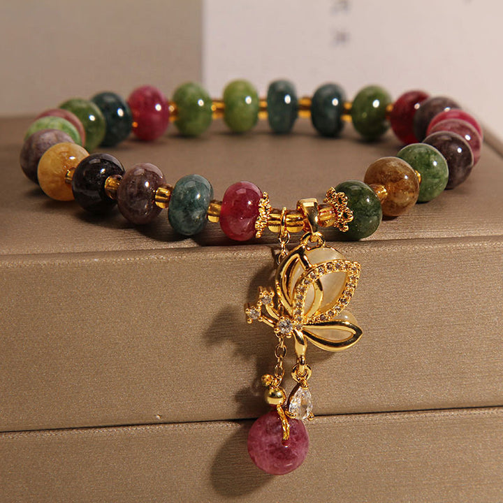 Pulsera de sabiduría con dije de mariposa y turmalina colorida con Buddha Stones