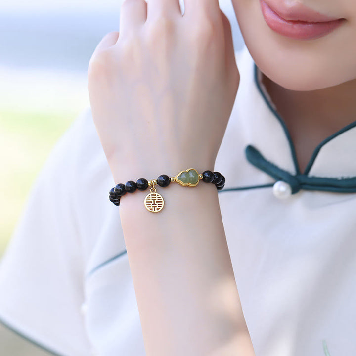 Pulsera de fuerza de doble felicidad con calabaza de jade hetiano de obsidiana negra natural