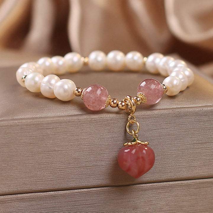 Pulsera con dije de sabiduría de corazón de amor de melocotón de cuarzo de fresa de perlas naturales de Buddha Stones