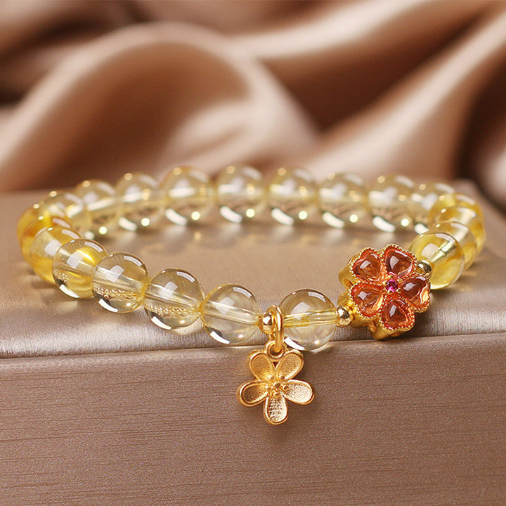 Pulsera de protección de prosperidad con dije de flor de citrino natural con Buddha Stones