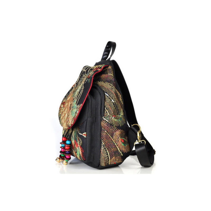 Mochila con borlas de lona con bordado de pavo real