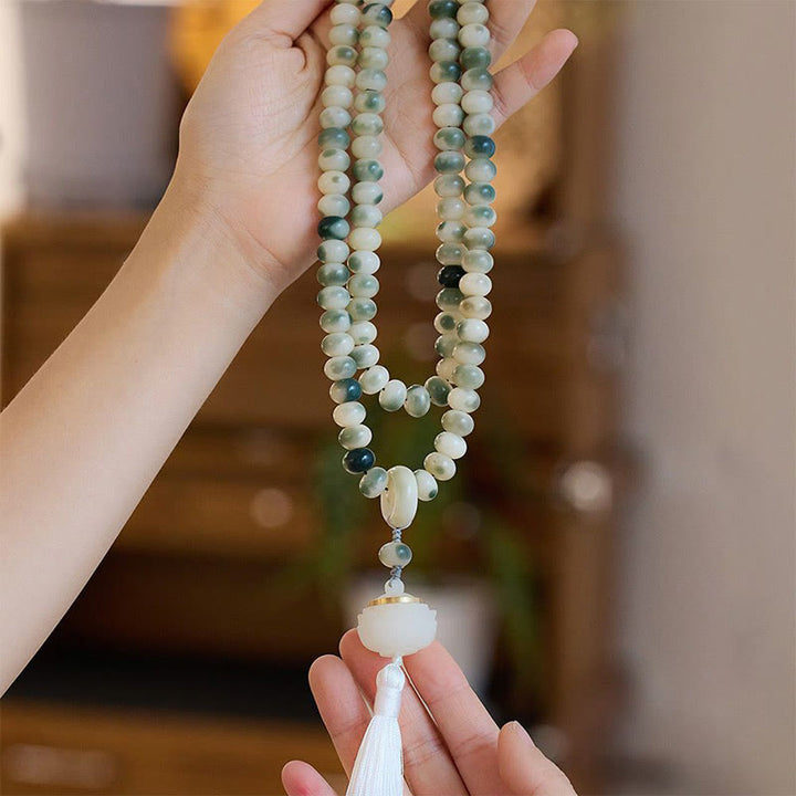 Buddha Stones Natural 108 cuentas Mala semilla Bodhi loto grabado sabiduría borla pulsera