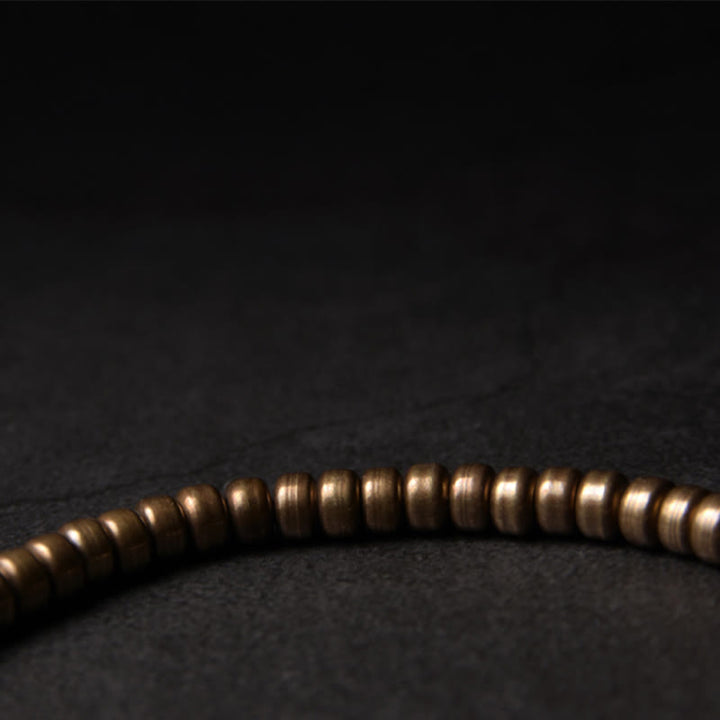Pulsera de la riqueza de la suerte con cuentas de cobre y latón de diseño simple de Buddha Stones