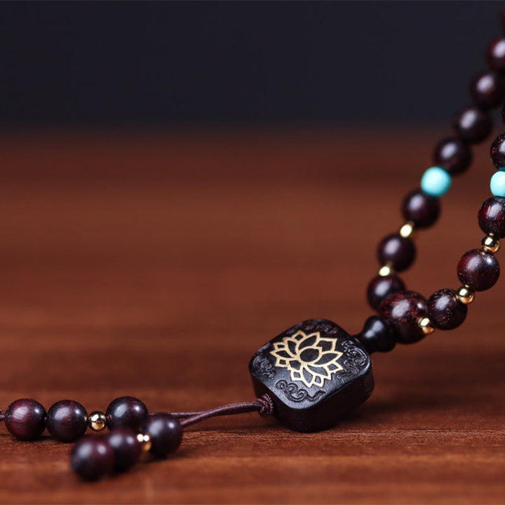 Buddha Stones 108 cuentas Mala tibetanas hoja pequeña sándalo rojo pulsera de equilibrio de loto
