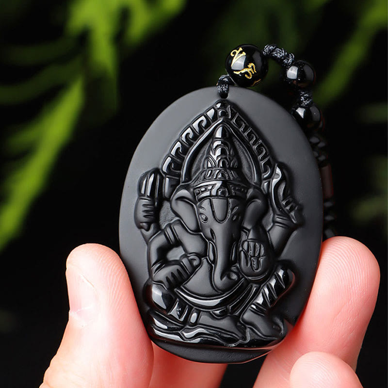 Collar con amuleto de riqueza de elefante Ganesh Ganpati de obsidiana tibetana con Buddha Stones