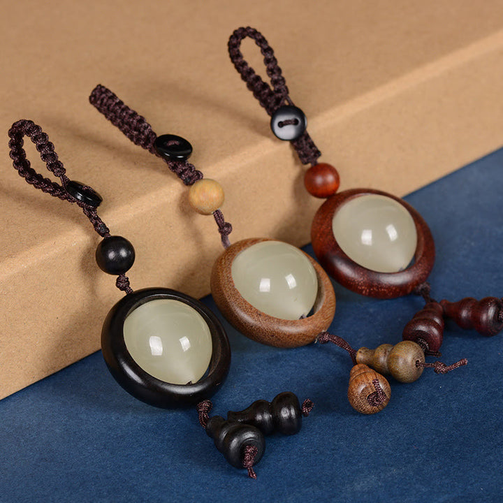 Buddha Stones, sándalo rojo, madera de ébano, sándalo verde, cuentas luminosas de la suerte, calabaza, llavero de la paz
