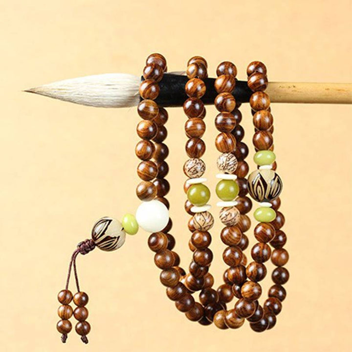 Pulsera Calma de Protección Mala de Palosanto Tibetano con Buddha Stones