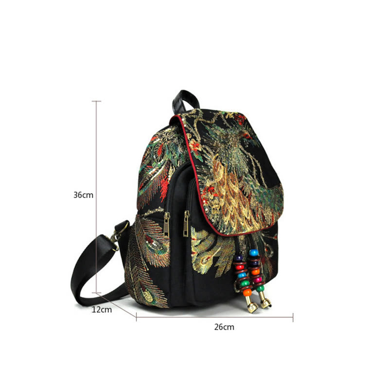Mochila con borlas de lona con bordado de pavo real