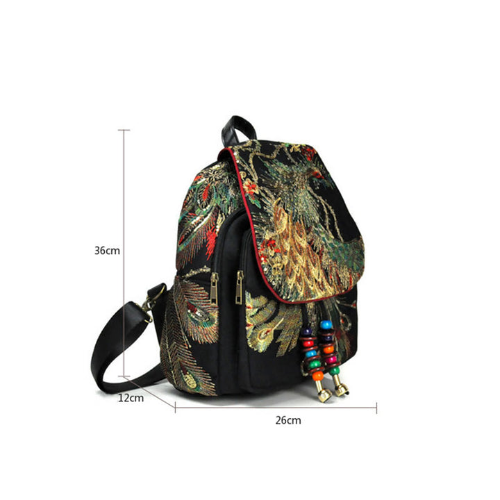 Mochila con borlas de lona con bordado de pavo real