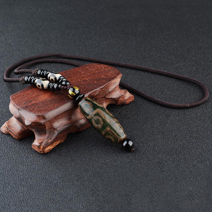 Collar de protección de la riqueza con cuentas Dzi de nueve ojos y Buddha Stones