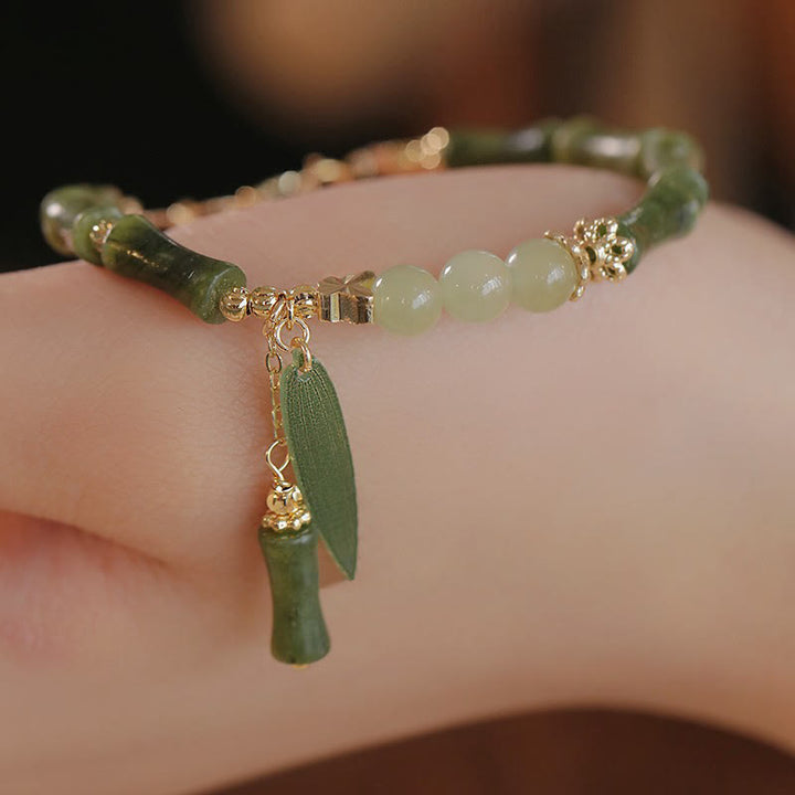 Pulsera de la abundancia de la suerte del patrón del lirio de los valles de la hoja de bambú del jade de las Buddha Stones