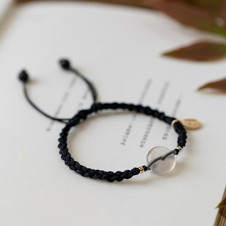 Pulsera de hilo positivo con hebilla de paz redonda de calcedonia con Buddha Stones