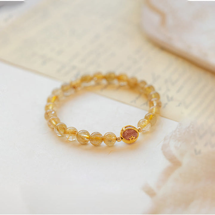 Pulsera de protección de estrella de cuarzo fresa de cuarzo rutilado dorado con Buddha Stones