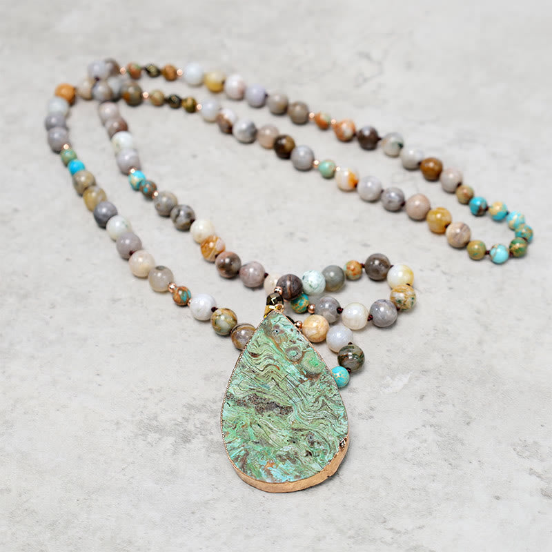 Collar curativo con cuentas de jaspe Picasso del océano natural de Buddha Stones