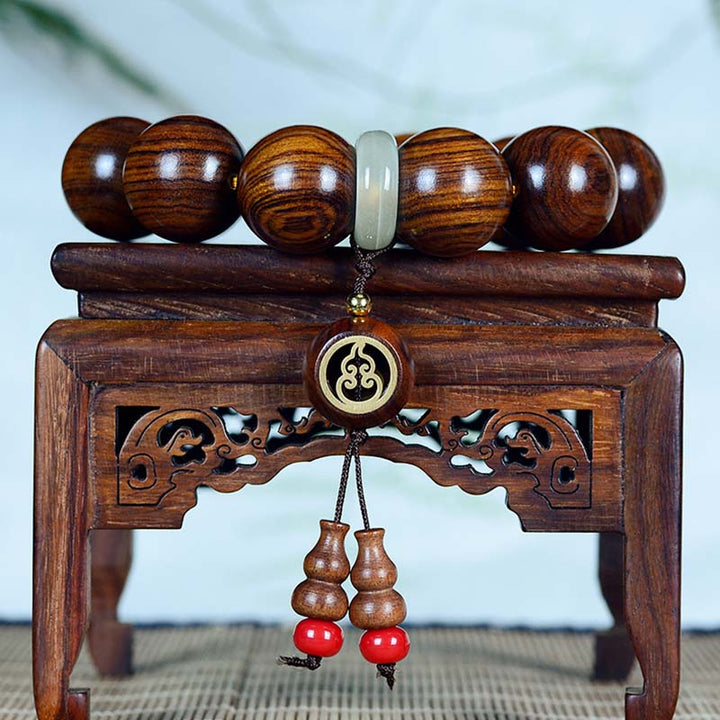 Pulsera con dije de Buddha Stones, palisandro, calidez, calma