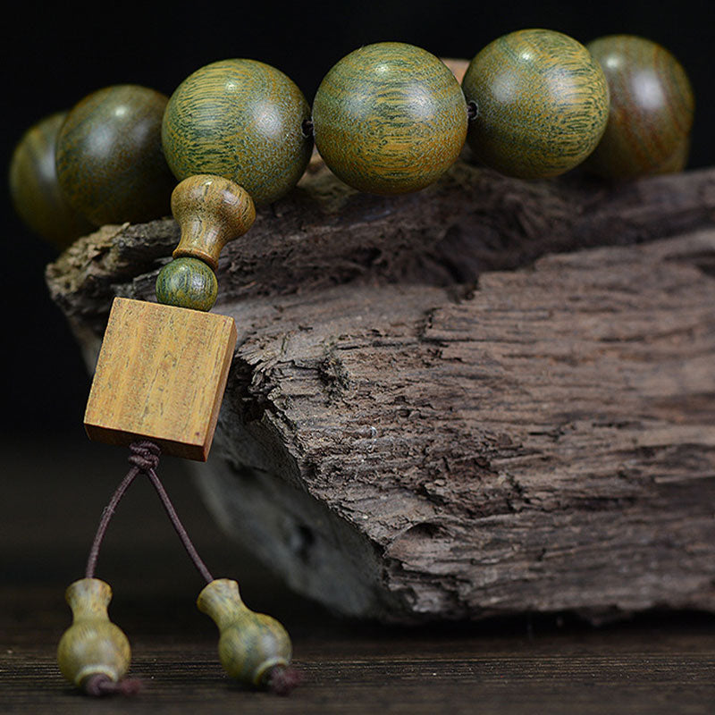 Pulsera curativa de sándalo verde tibetano con Buddha Stones - image 5