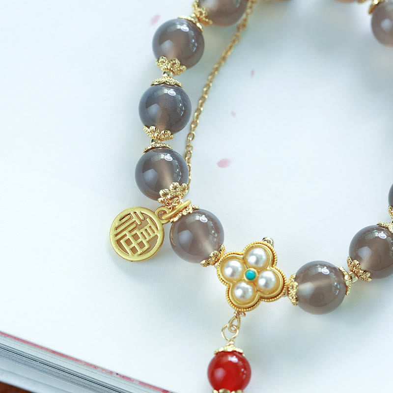 Pulsera de equilibrio con borlas y perlas de carácter Fu de ágata gris natural con Buddha Stones