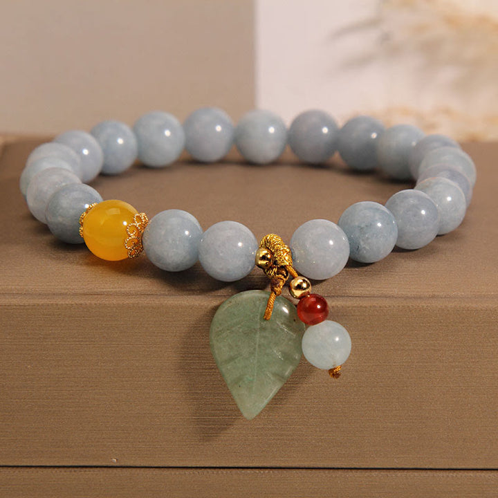 Pulsera con dijes curativos de hojas de jade, aguamarina y Buddha Stones