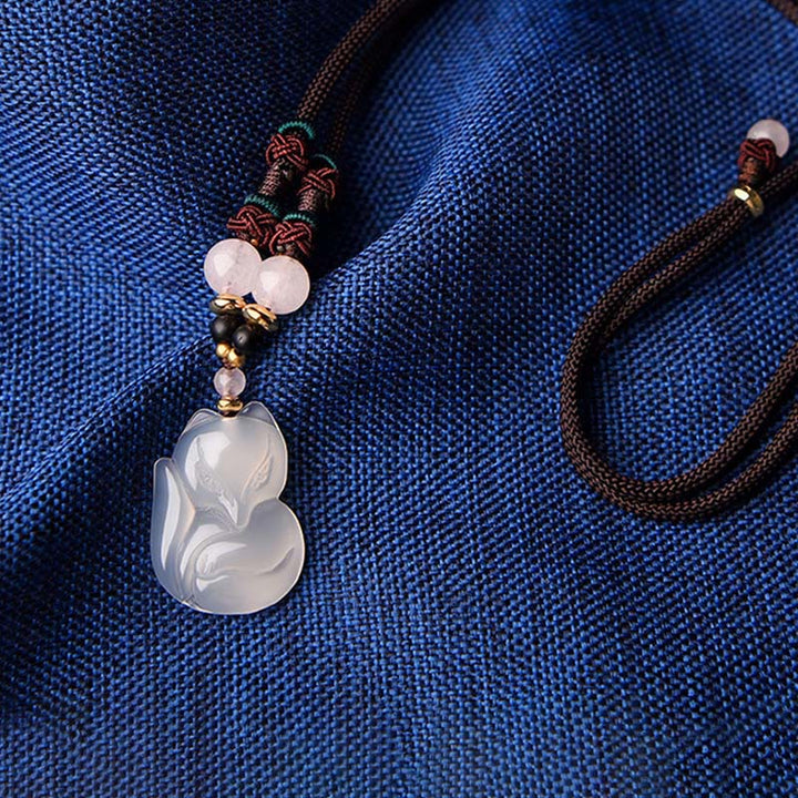Collar con colgante de cadena de armonía con cuentas de cristal rosa de zorro de calcedonia con Buddha Stones