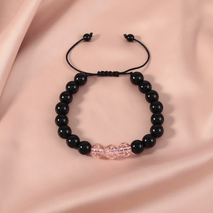 Pulsera de fuerza con piedra luminosa luminosa de obsidiana negra de Buddha Stones