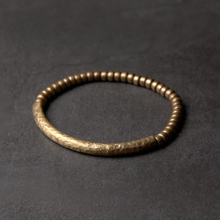 Pulsera de la riqueza de la suerte con cuentas de cobre y latón de diseño simple de Buddha Stones