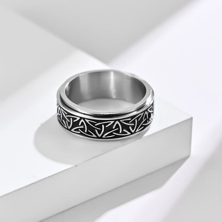 Anillo giratorio calmante de acero titanio Triquetra con nudo triangular de Buddha Stones