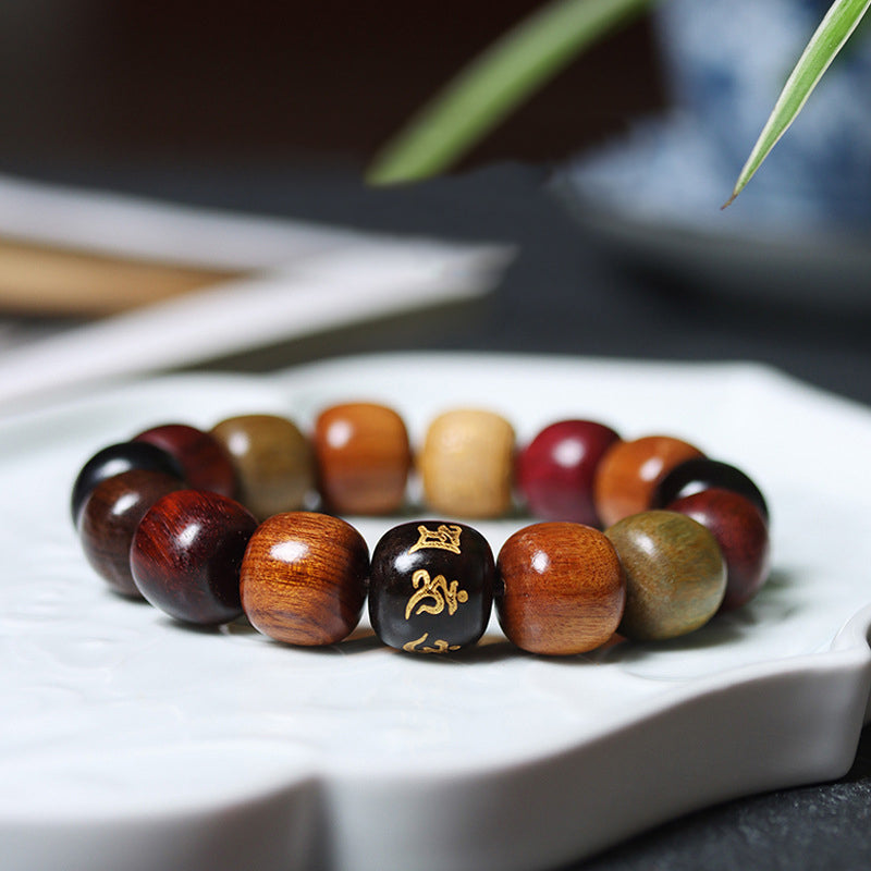 Pulsera de pureza Om Mani Padme Hum de varias maderas del Tíbet con Buddha Stones