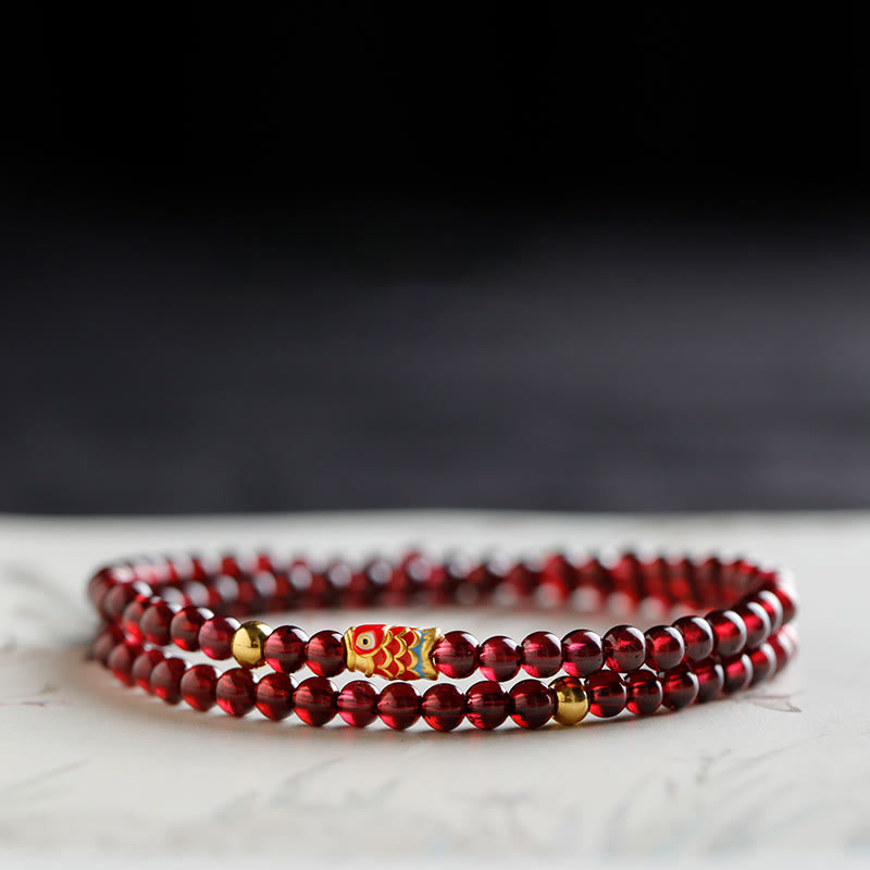 Pulsera de protección con granate natural y pez Koi de oro 999 de Buddha Stones - Pulsera doble de 4 mm con diseño de pez koi en granate y oro - 17 cm - image 8