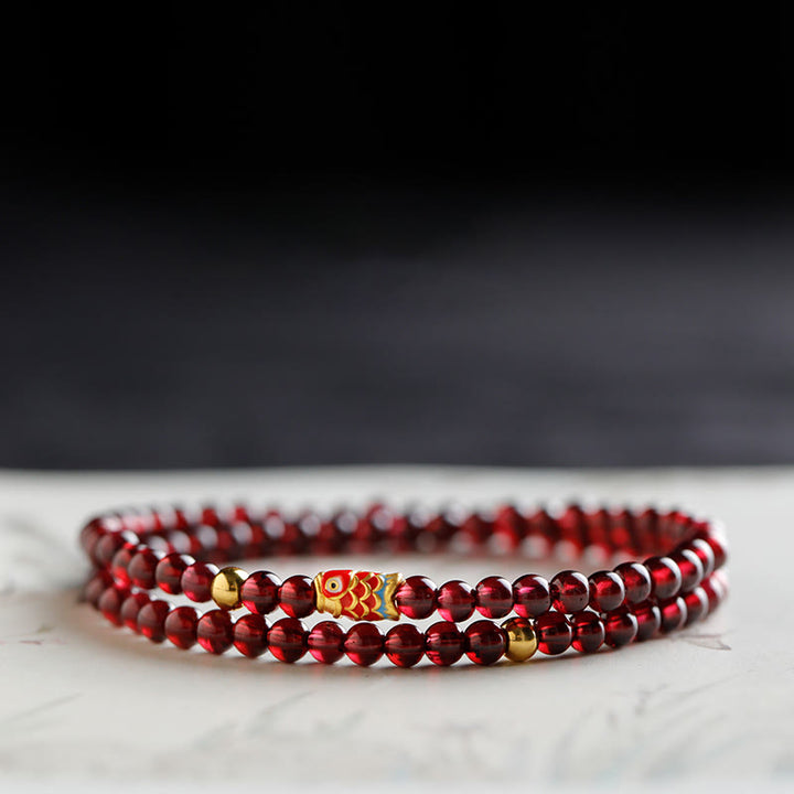 Pulsera de protección con granate natural y pez Koi de oro 999 de Buddha Stones - Pulsera doble de 4 mm con diseño de pez koi en granate y oro - 17 cm - image 8