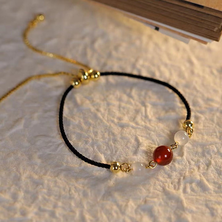 Pulsera de confianza con hilo trenzado y ojo de gato de ágata roja con Buddha Stones - image 7