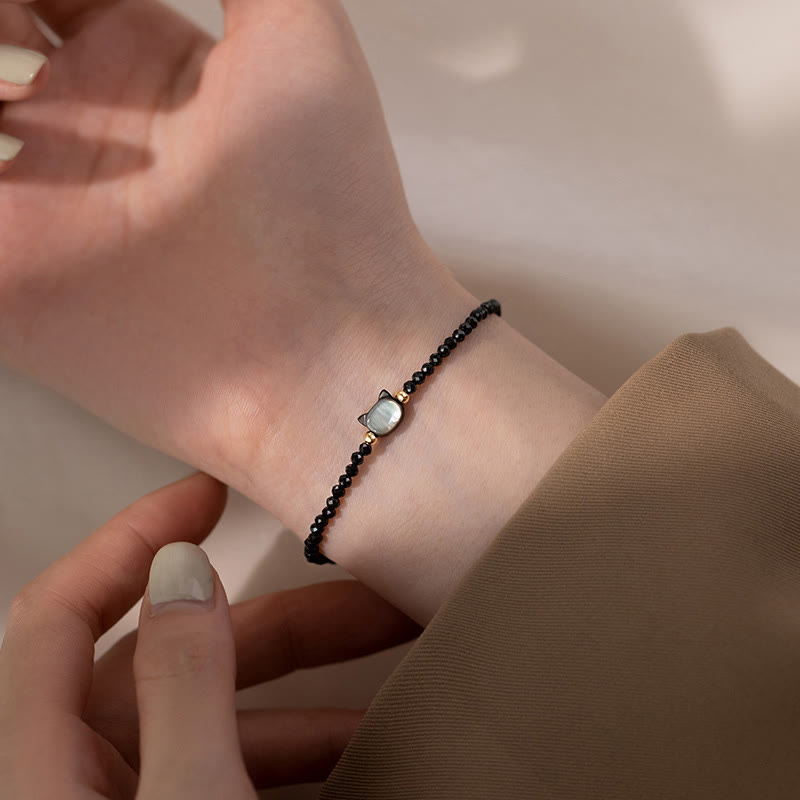 Pulsera curativa de piedra Tridacna de gato lindo de cristal blanco de espinela negra chapada en oro de 14 quilates con Buddha Stones - image 6