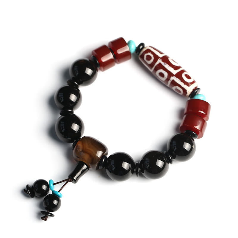 Pulsera tibetana de protección de la riqueza de ónix negro con cuentas Dzi de nueve ojos