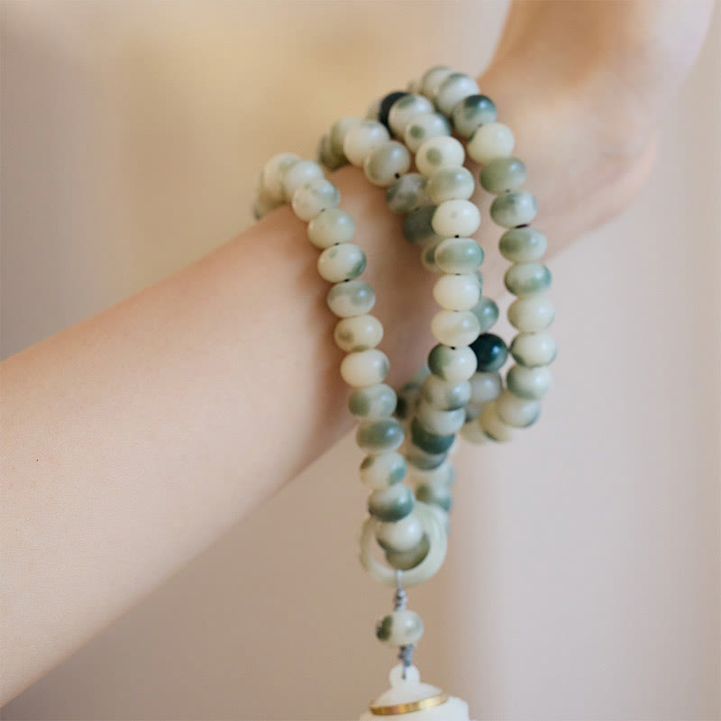 Buddha Stones Natural 108 cuentas Mala semilla Bodhi loto grabado sabiduría borla pulsera