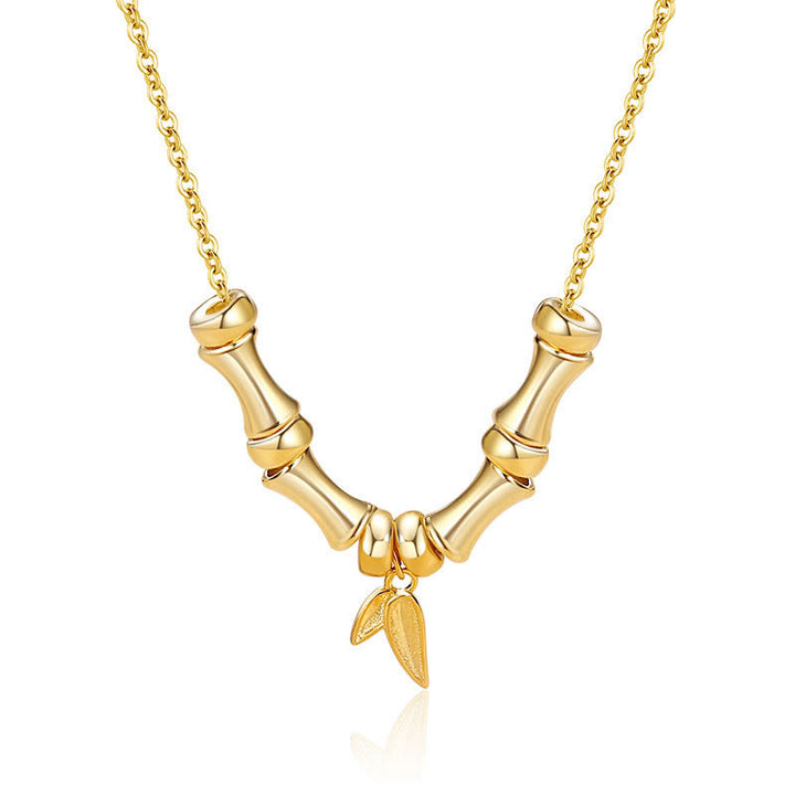 Colgante de collar de riqueza de acero titanio con patrón de bambú dorado con Buddha Stones