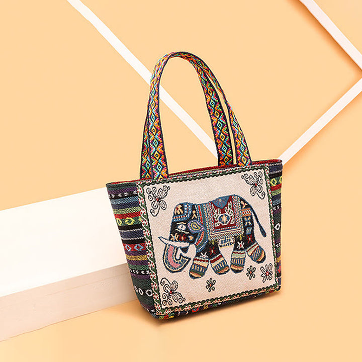 Bolso bandolera de lona de gran capacidad con bordado de mariposa y elefante