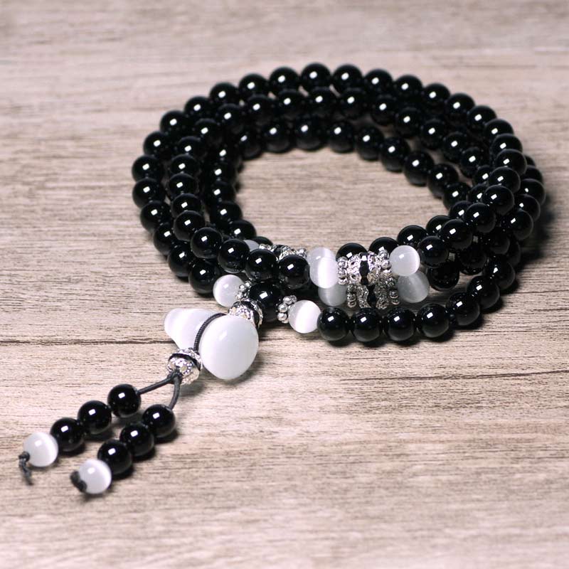 Pulsera de meditación con cuentas de cristal blanco de ónix negro