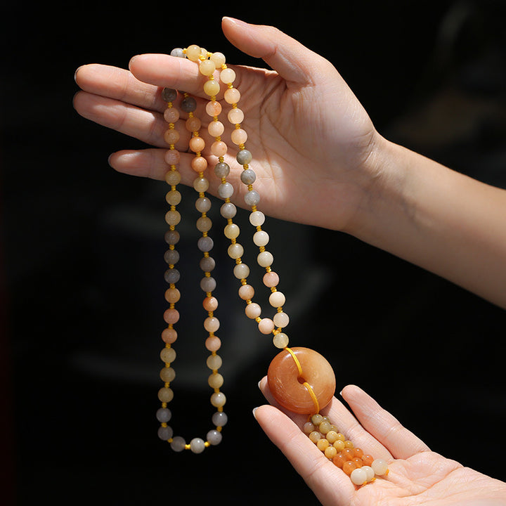 Collar con colgante de riqueza de jade de seda dorada tibetana con Buddha Stones