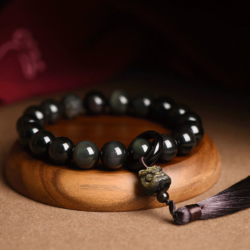 Buddha Stones negra Natural León muñeca Mala protección borlas bolsillo Mala decoración del coche