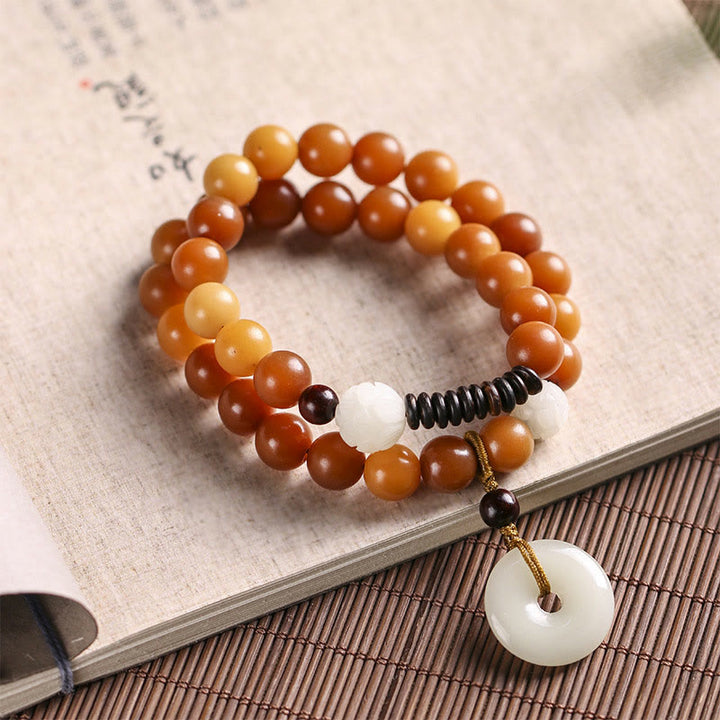 Pulsera de doble envoltura con hebilla de paz y jade de loto, semilla de Bodhi cian
