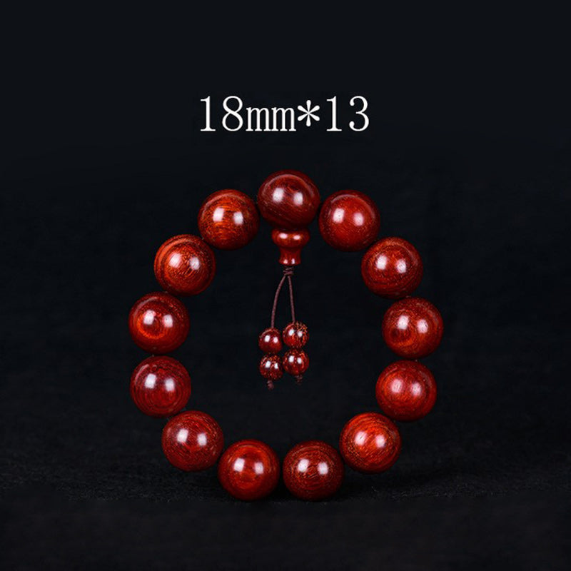 Pulsera de equilibrio de sándalo rojo con hoja pequeña tibetana de Buddha Stones