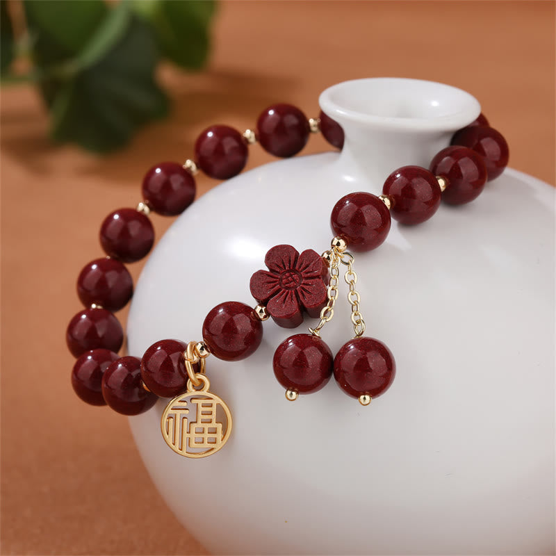 Pulsera de bendición de flor de cerezo con personaje de cinabrio de Buddha Stones