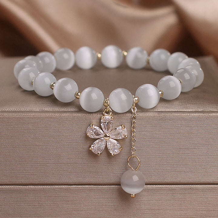 Pulsera de apoyo a la paz con dije de flor de ojo de gato y Buddha Stones