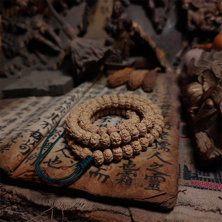 108 cuentas de Mala Rudraksha Bodhi Semilla Suerte Riqueza Borla Pulsera cuádruple
