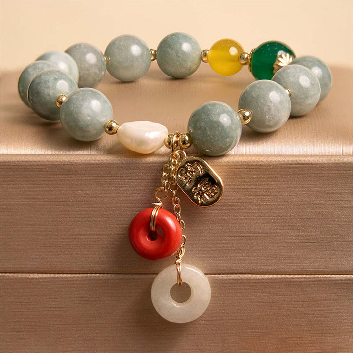 Pulsera de confianza con dije de hebilla de paz y ágata roja de jade con Buddha Stones